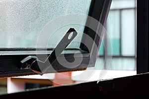 Open window with water drop on the glass