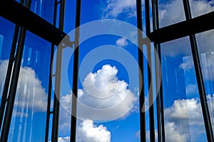 Open windows or building frame facing clouds