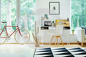 Open workspace with white chair