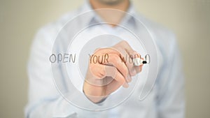 Open Your World , man writing on transparent screen