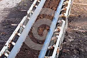 Opencast brown coal mine. Belt conveyor.