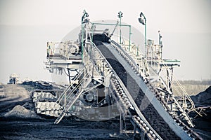 Opencast brown coal mine. Belt conveyor.