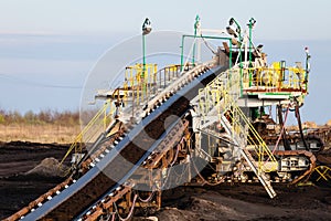 Opencast brown coal mine. Belt conveyor.