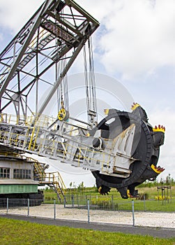 Opencast brown coal mine. Excavator SchRs-315. Extractive industry