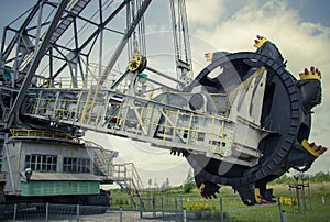 Opencast brown coal mine. Excavator SchRs-315. Extractive industry