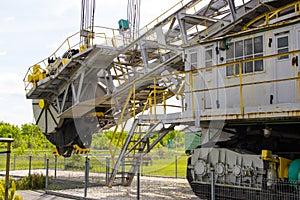 Opencast brown coal mine. Excavator SchRs-315. Extractive industry