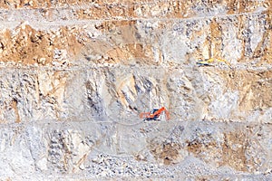 Opencast limestone mine with mining machines