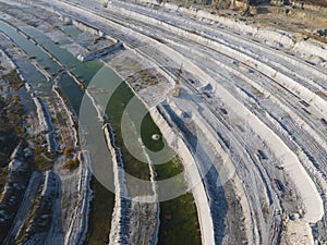 Opencast mining quarry - Aerial view. Industrial Extraction of l