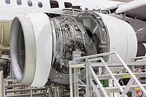 Opened aircraft engine in the hangar