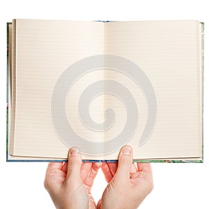 Opened book in hands