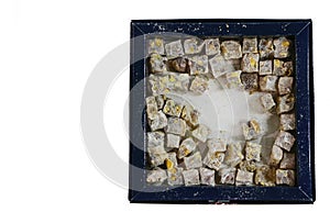 Box with Turkish delight on an isolated background.