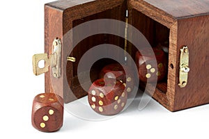 Opened box with wooden dice