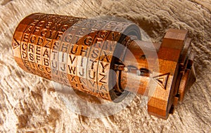 Opened brass cryptex invented by Leonardo da Vinci from the book da vinci code. Cryptographic equipment printed on a 3D