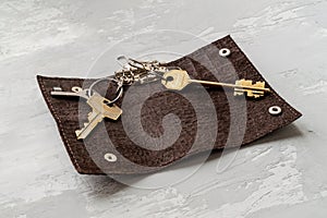 Opened brown leather key holder