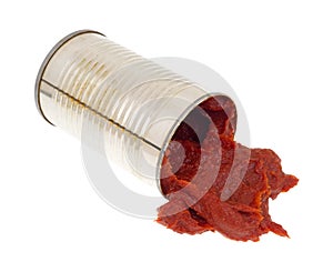 Opened can of tomato paste spilling