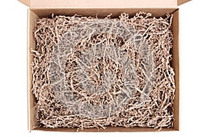 Opened cardboard posting and shipping box with tissue krinkles