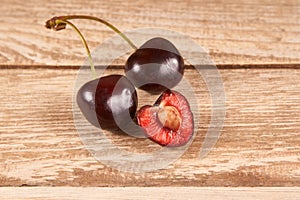 Cherries on wooden background photo