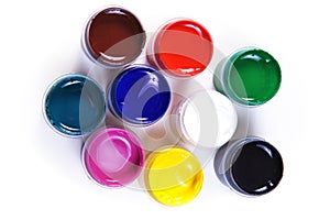 Opened containers with paint of different colours