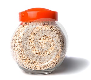 Opened glass jar with rolled oats isolated on white background glass jar with oatmeal flakes isolated