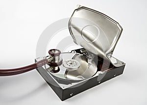 Opened hard disk with stethoscope