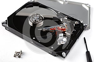 Opened hard drive from the computer hdd disk drive with mirror effects. Hard drive repairing