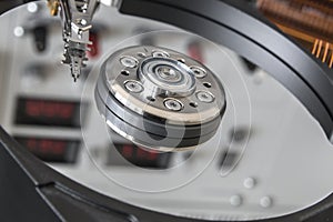 Opened HDD disc drive and reflection of laboratory panel