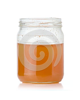 Opened jar of honey