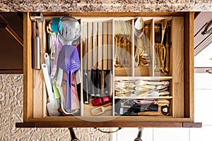 Opened kitchen drawer , a smart solution for kitchen storage and organizing