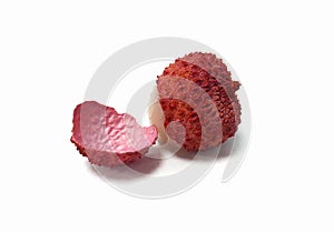 Opened lychee fruit on a white background
