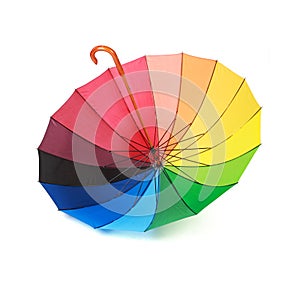 Opened multicoloredd umbrella handle up isolated