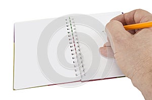 Opened notepad with pen or pencil on the white background.