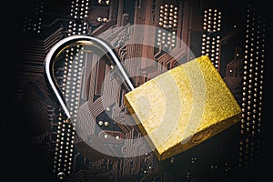Opened padlock on computer motherboard. Internet data privacy information security concept. Toned image.