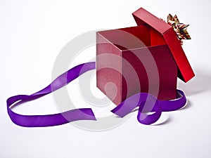 Opened Present with purple ribbon