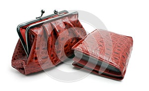 Opened red clutch bag and wallet