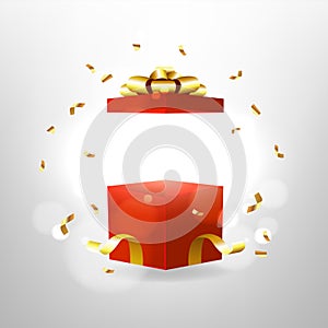 Opened red gift box with red bow and gold ribbon. Surprise box with magic effect.