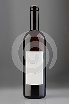 Opened red wine bottle with blank label