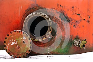 Opened rusty manhole photo