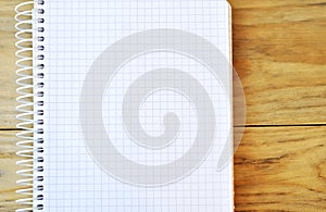 Opened Spiral Bound Notebook With Blank White Pages On Table