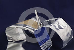 Opened sterile package containing surgical scalpel blade