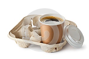 Opened take-out coffee in holder