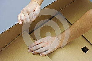 Opening cardboard box
