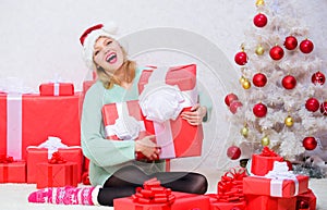 Opening christmas gift. Girl near christmas tree happy celebrate holiday. Give her gift that she always wanted. Woman