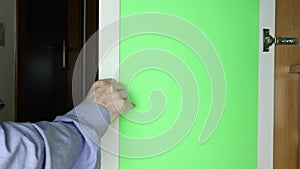 Opening wardrobe door with green screen chroma key