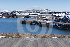 Opening wooden floor, Valcano mount and lake in Myvatn Winter landscape