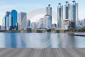 Opening wooden floor, Water pool at Public Park with office building