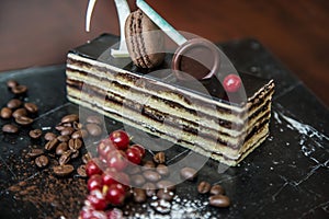 opera dessert with macaron and coffee beans