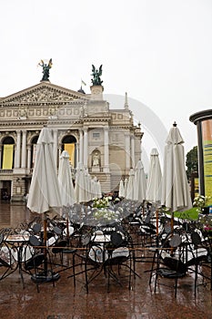 Opera theater and cafe before him. Lviv