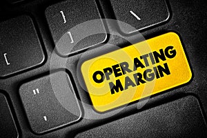 Operating Margin is the ratio of operating income to net sales, usually expressed in percent, text button on keyboard, concept