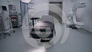 Operating room with advanced equipment in clinic or medical facility