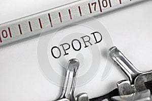 Operation order acronym OPORD text macro closeup, typewriter typed leader directive to subordinates, coordinated military combat photo